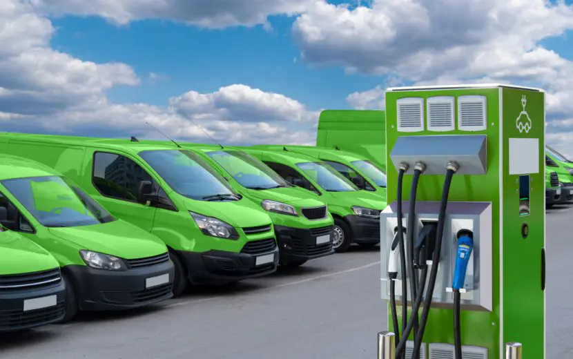 Electric,Vehicles,Charging,Station,On,A,Background,Of,A,Row